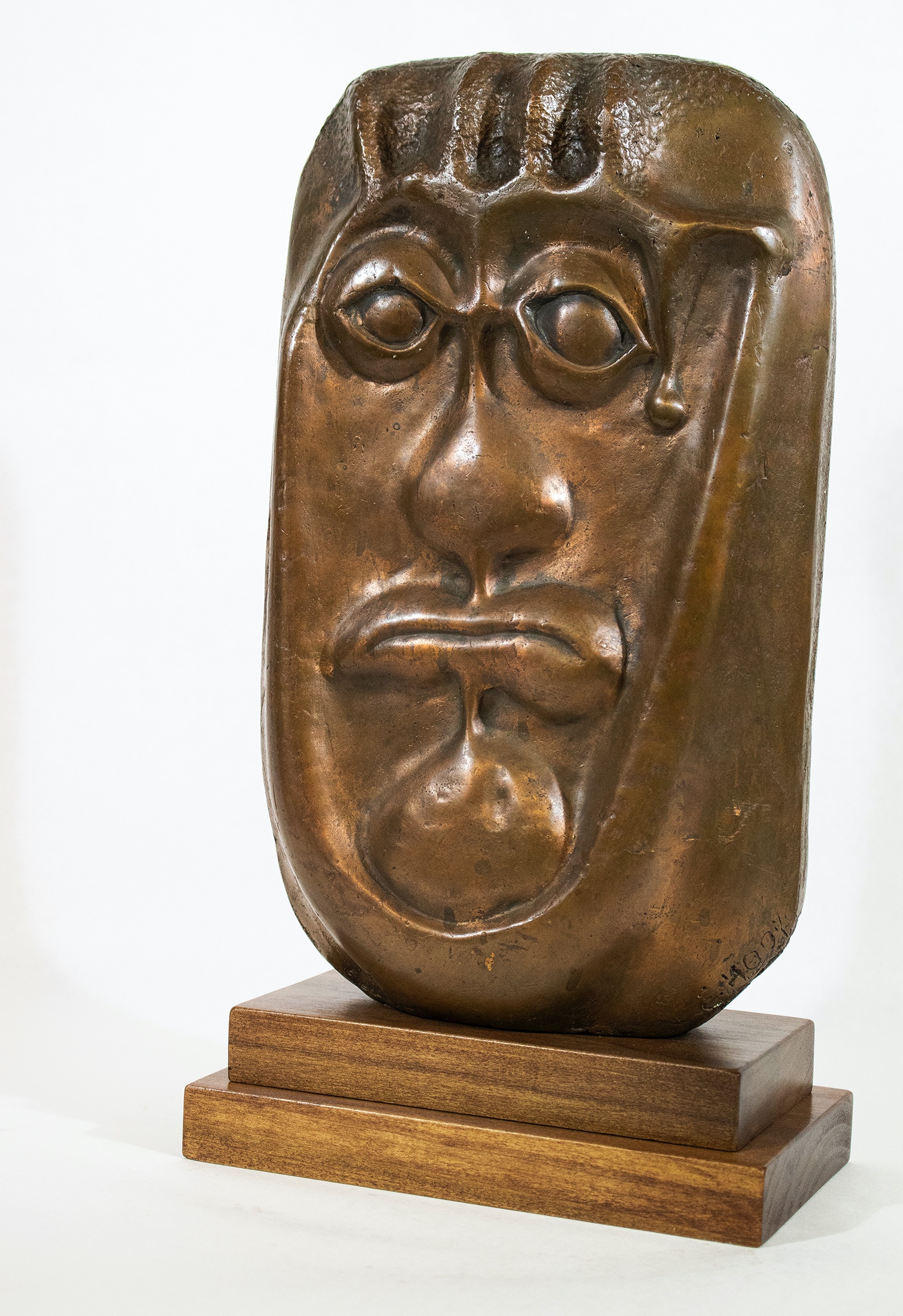 A Cast Bronze Portrait Of A Man.
